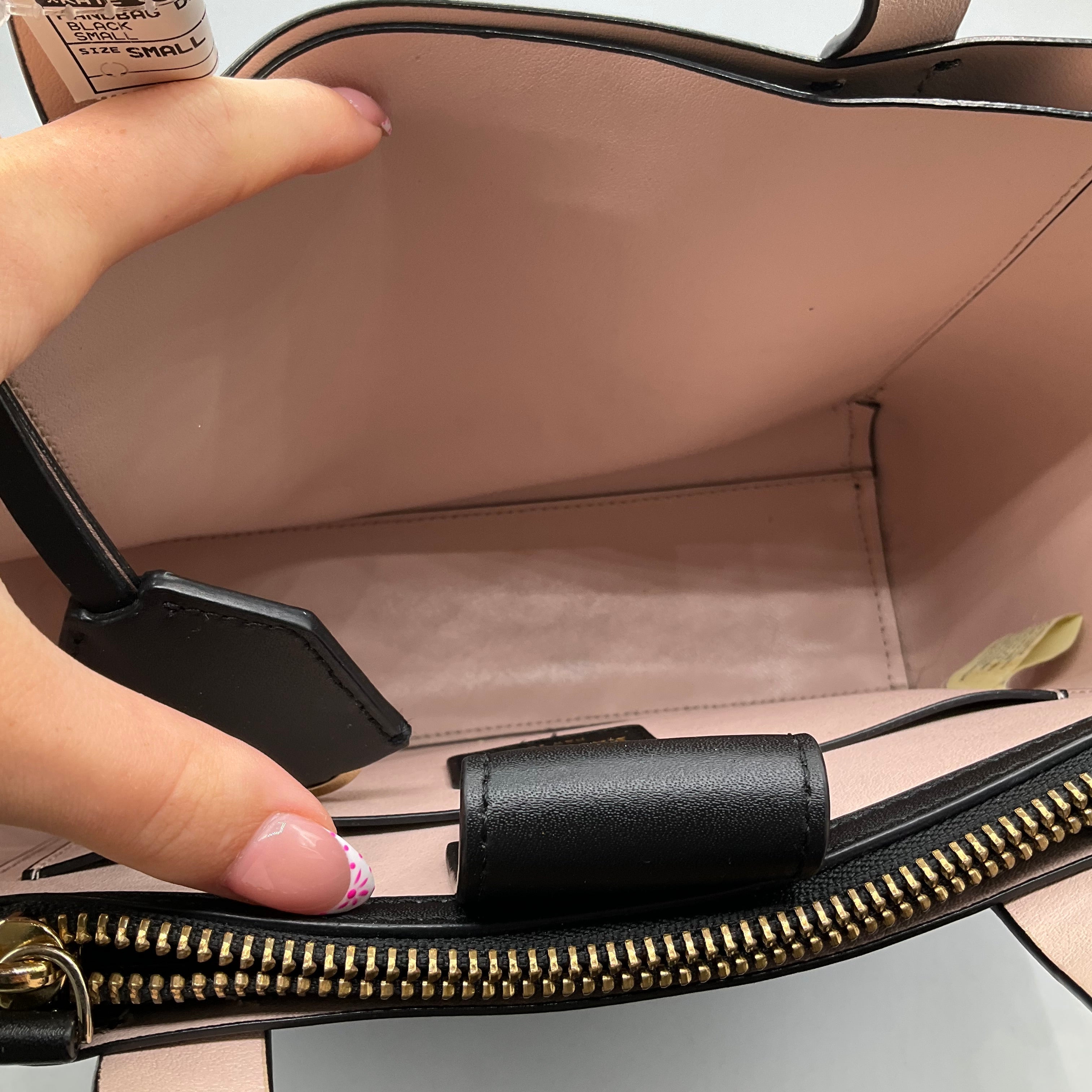 Handbag Designer By Kate Spade. Size: Small