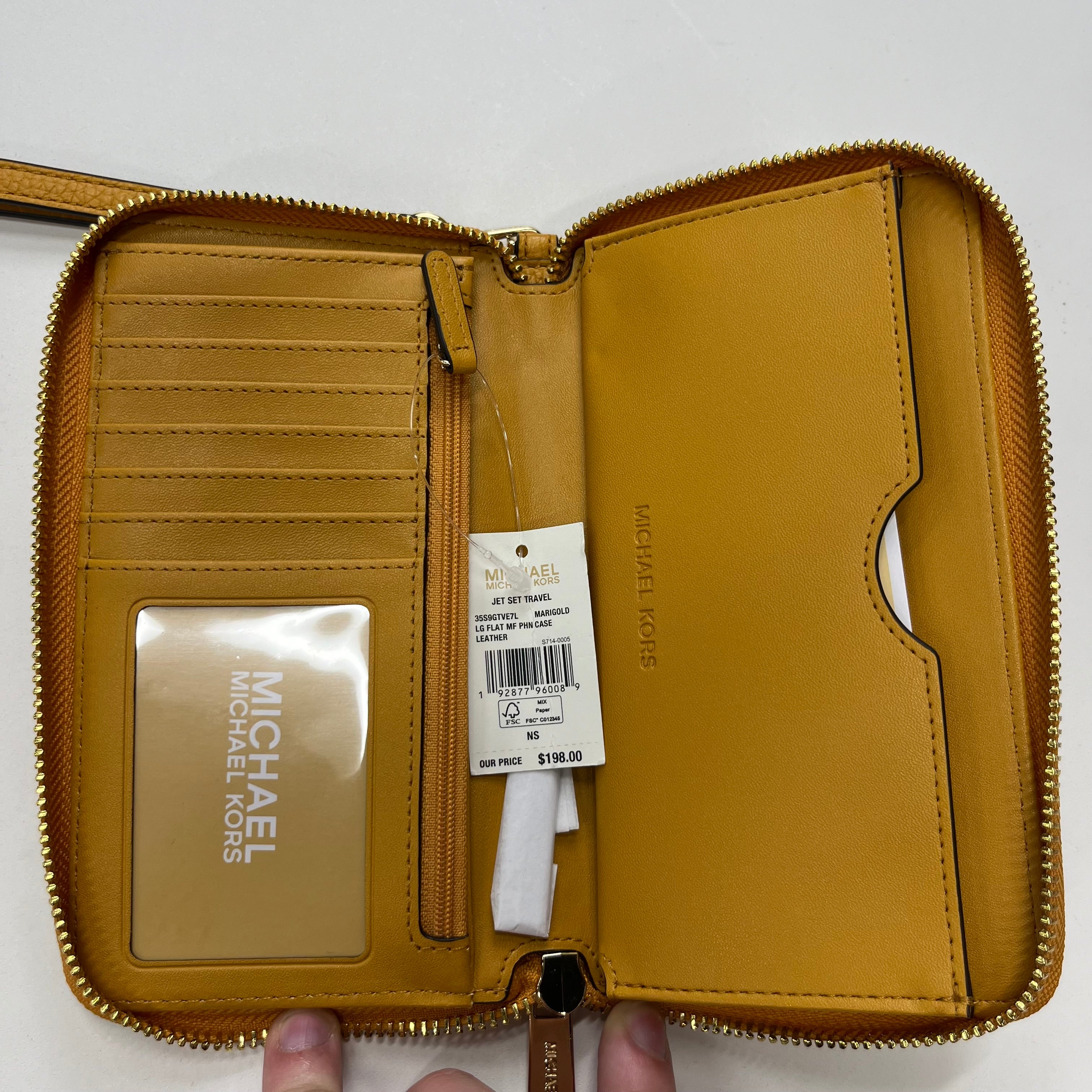 Wristlet Michael Kors NWT. Size Medium