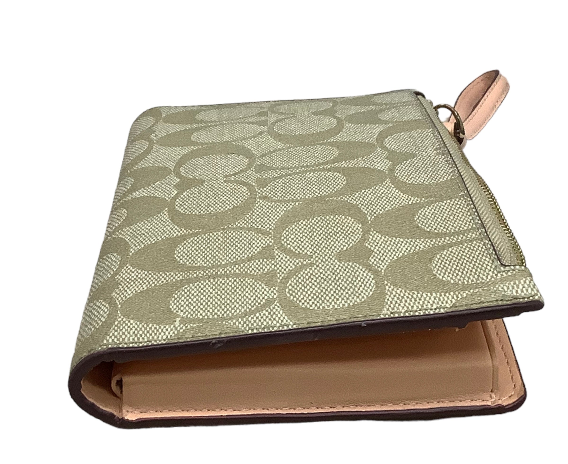 Tan Wristlet Designer by Coach. Size Medium