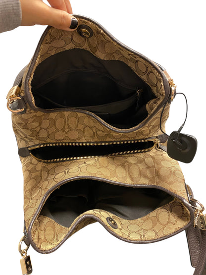 Handbag Designer By Coach. Size: Medium