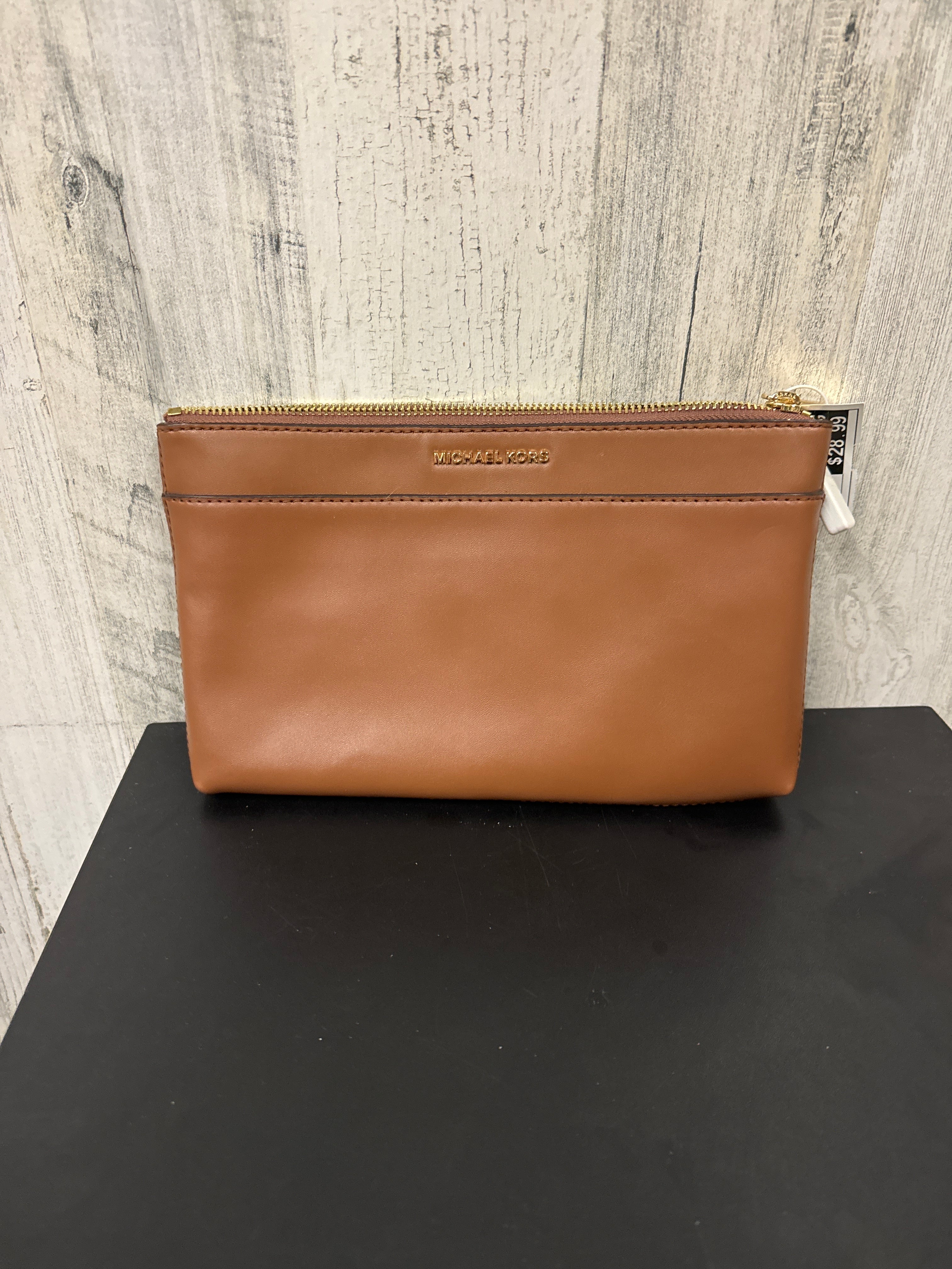 Clutch Designer Michael Kors. Size Medium