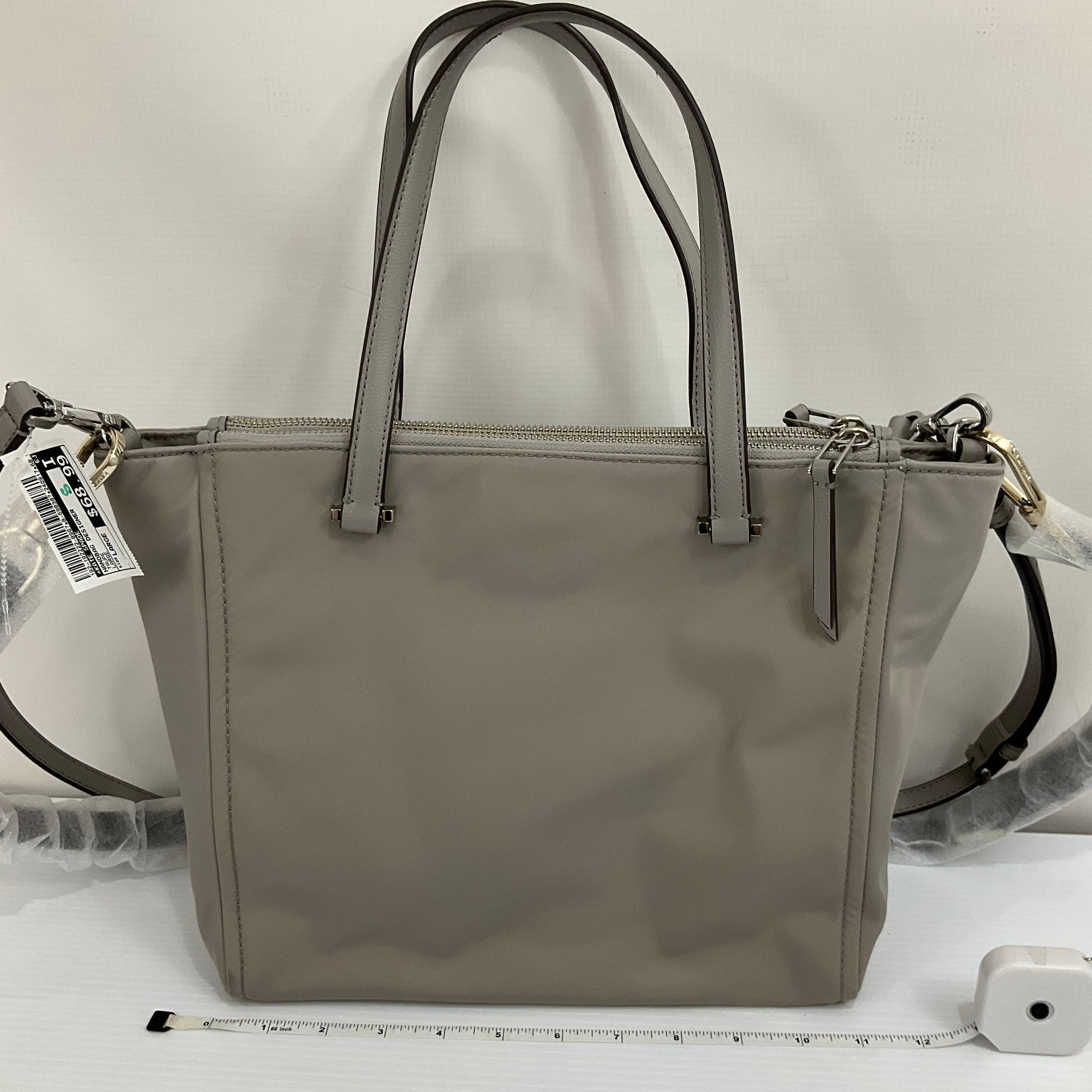 Handbag Designer By Kate Spade. Size: Large