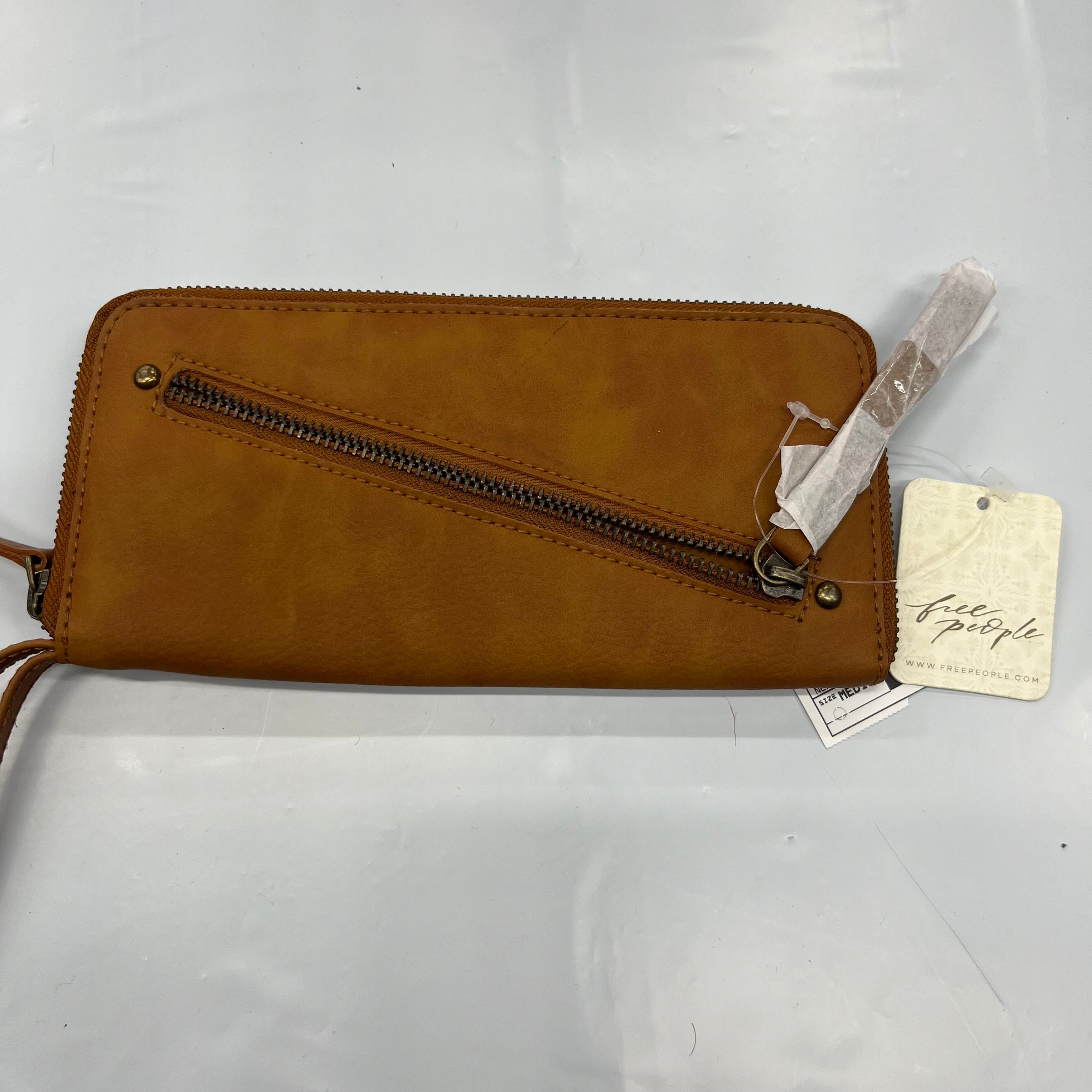 Wristlet Free People NWT. Size Medium