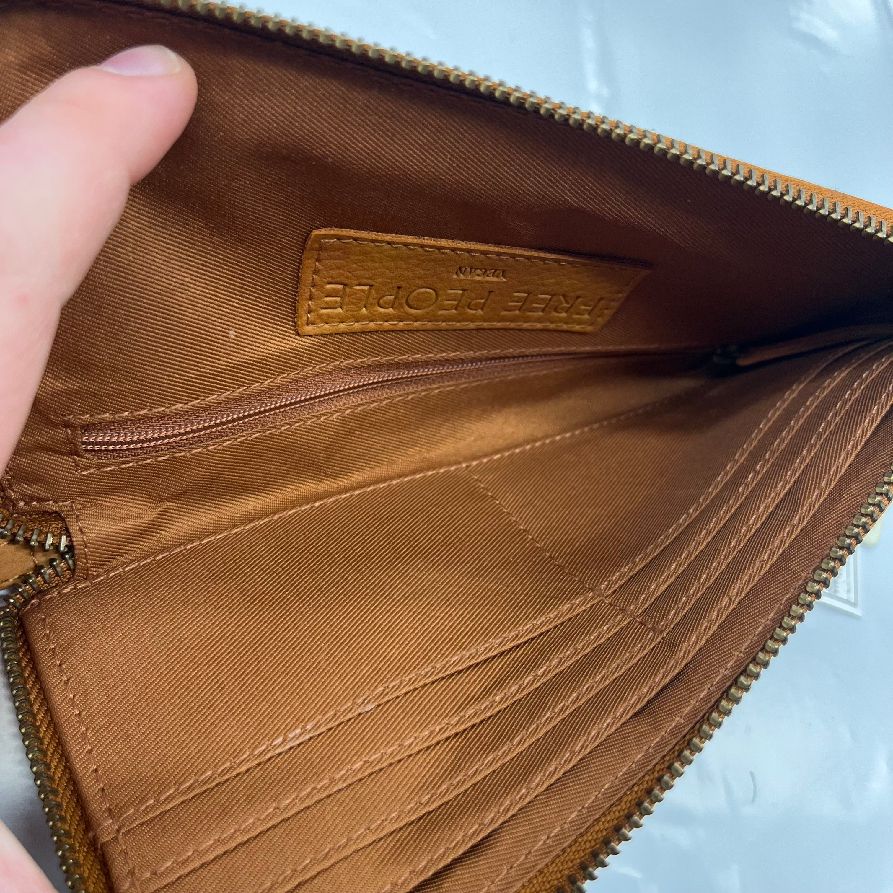 Wristlet Free People NWT. Size Medium