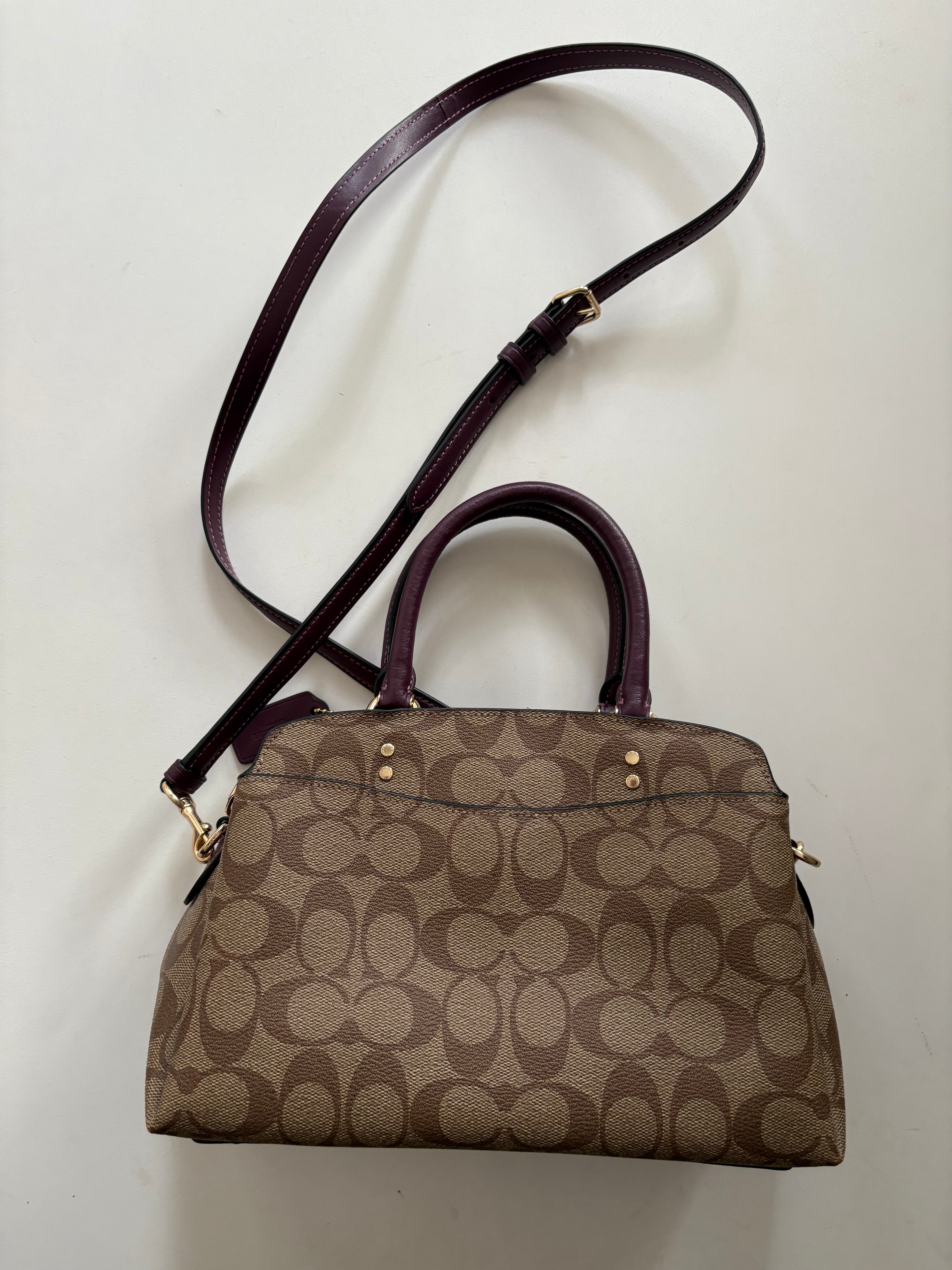 Handbag Designer By Coach. Size: Medium