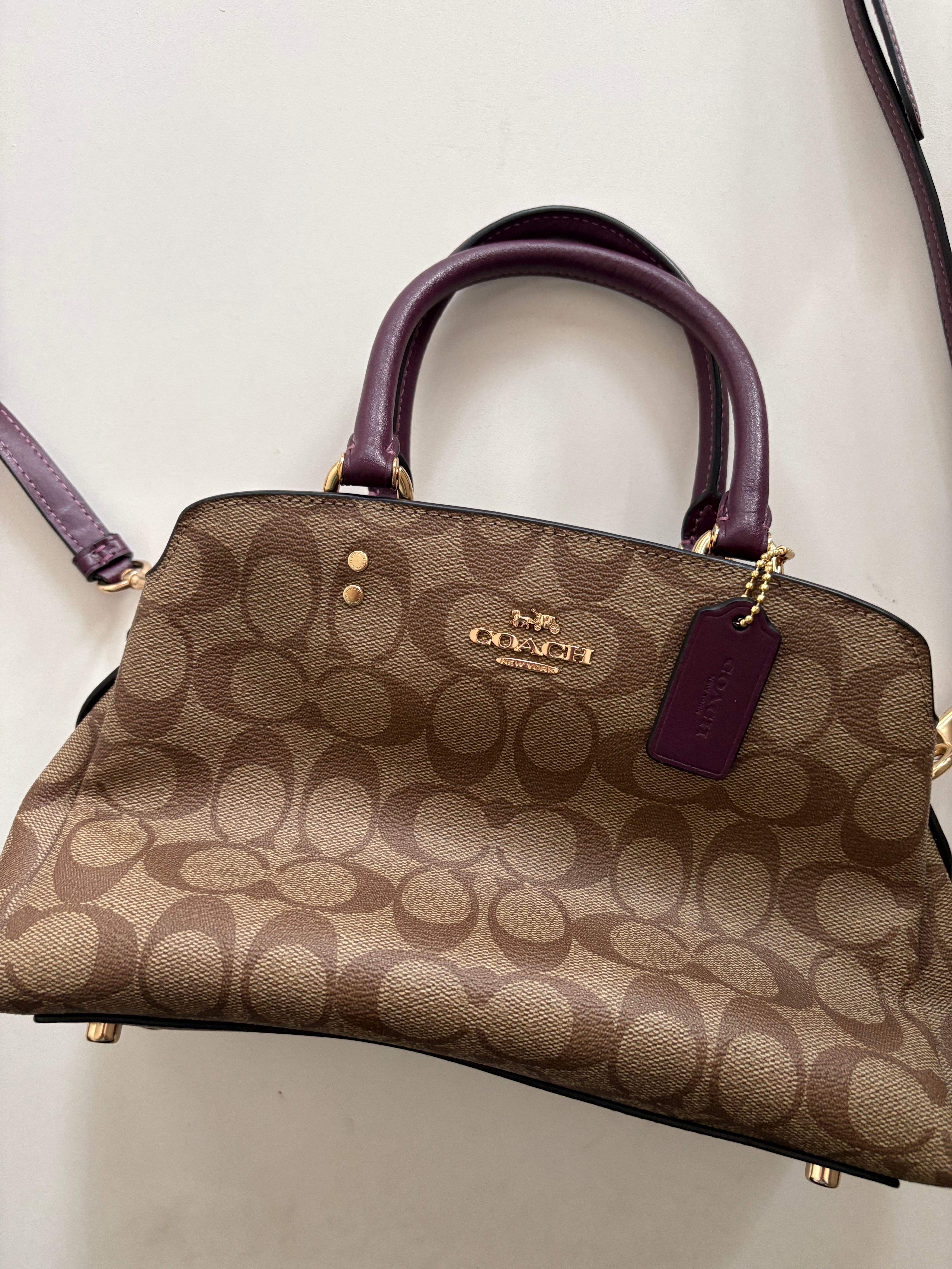 Handbag Designer By Coach. Size: Medium