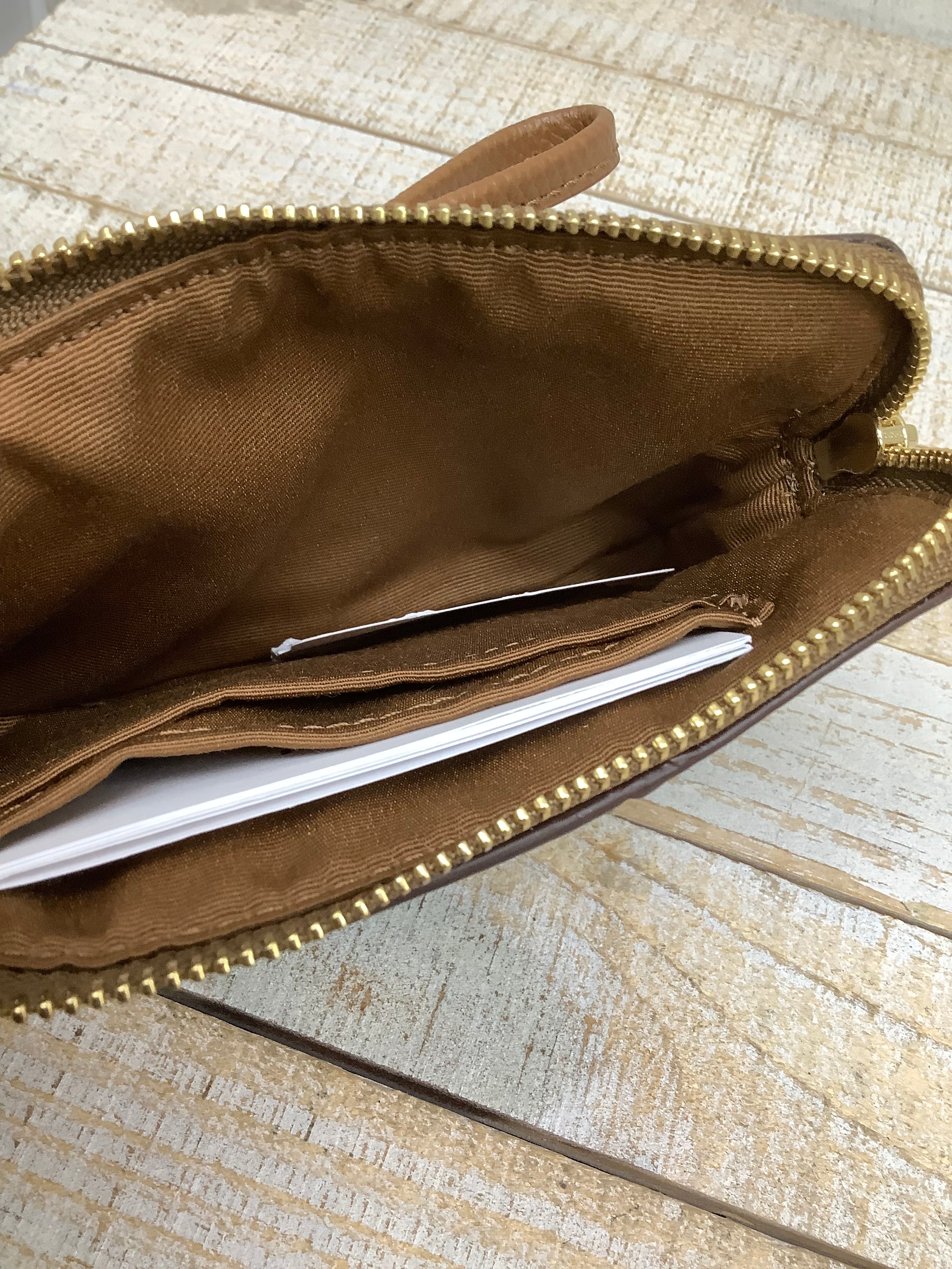 Wristlet Designer by Coach. Size Small