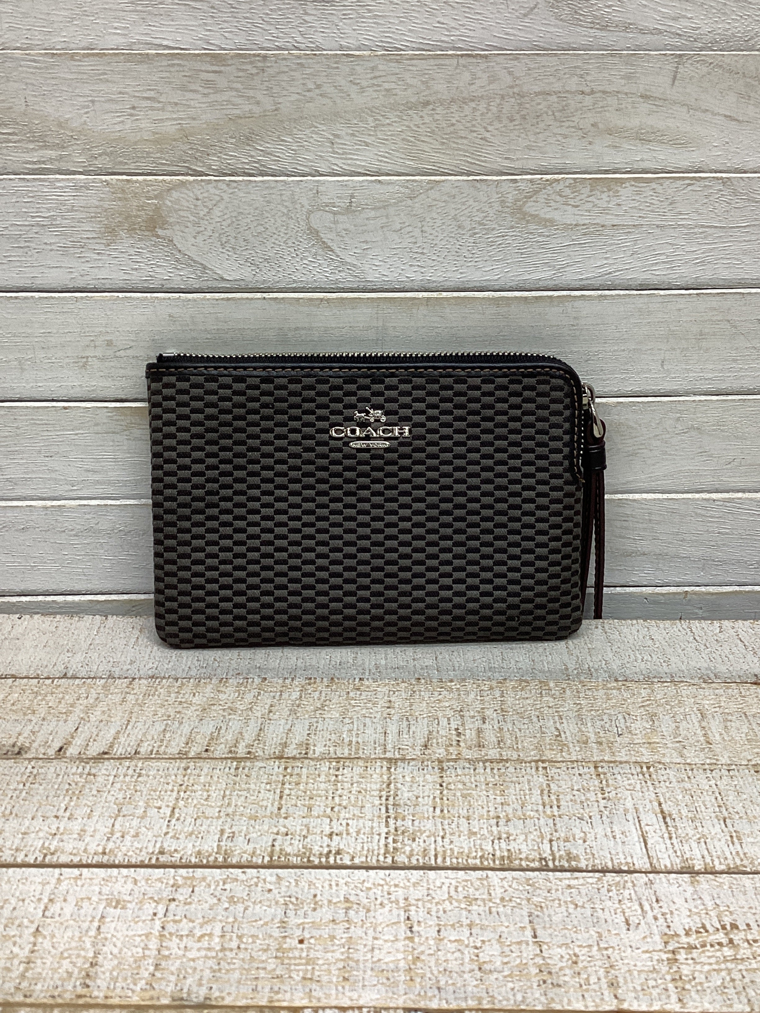 Wristlet designer By Coach. Size: Small