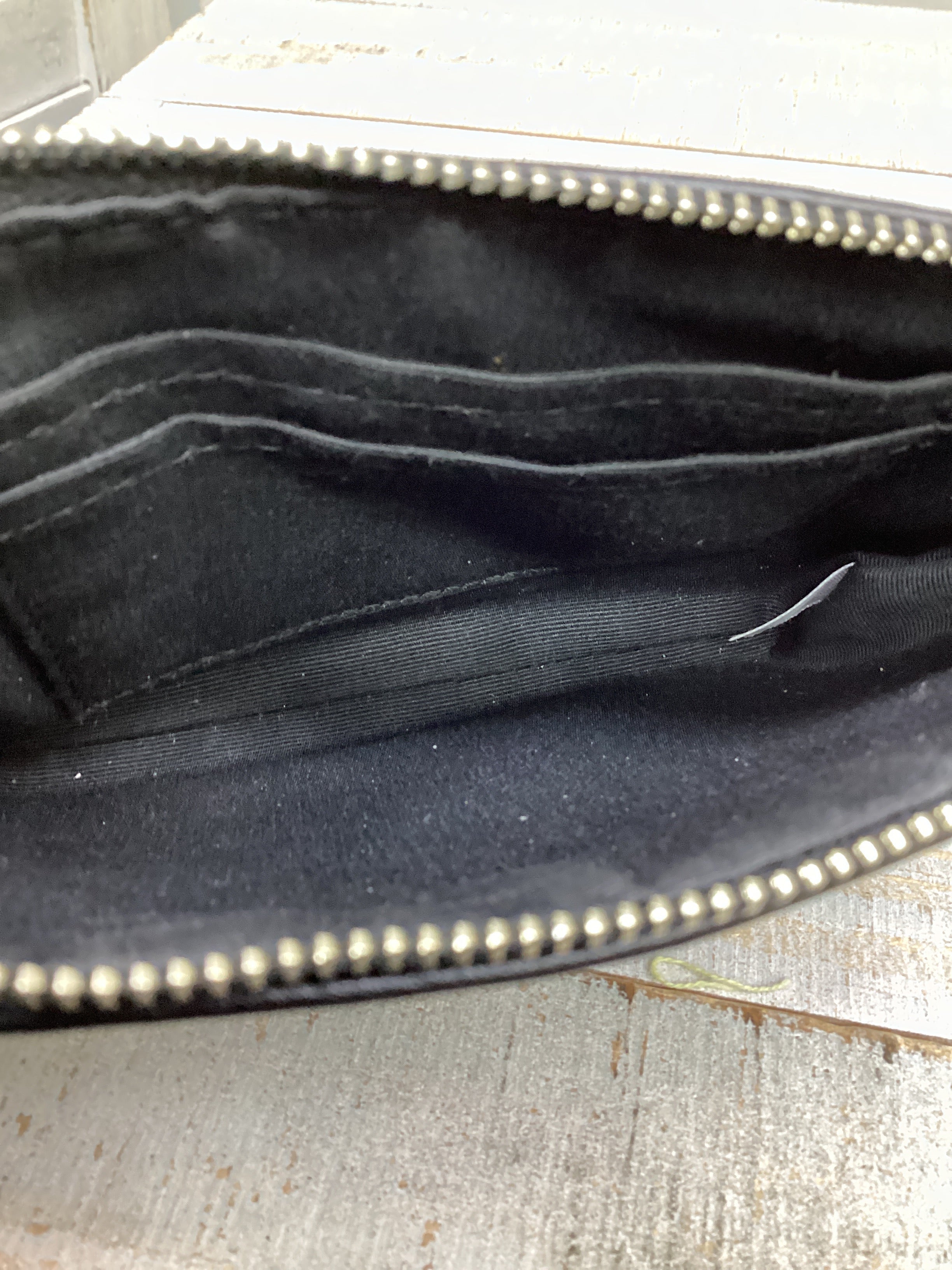 Wristlet designer By Coach. Size: Small