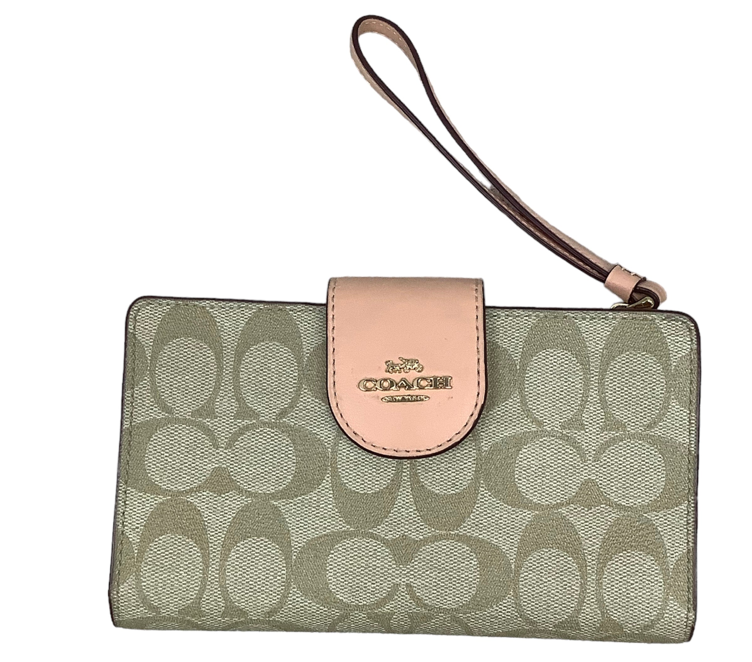 Tan Wristlet Designer by Coach. Size Medium