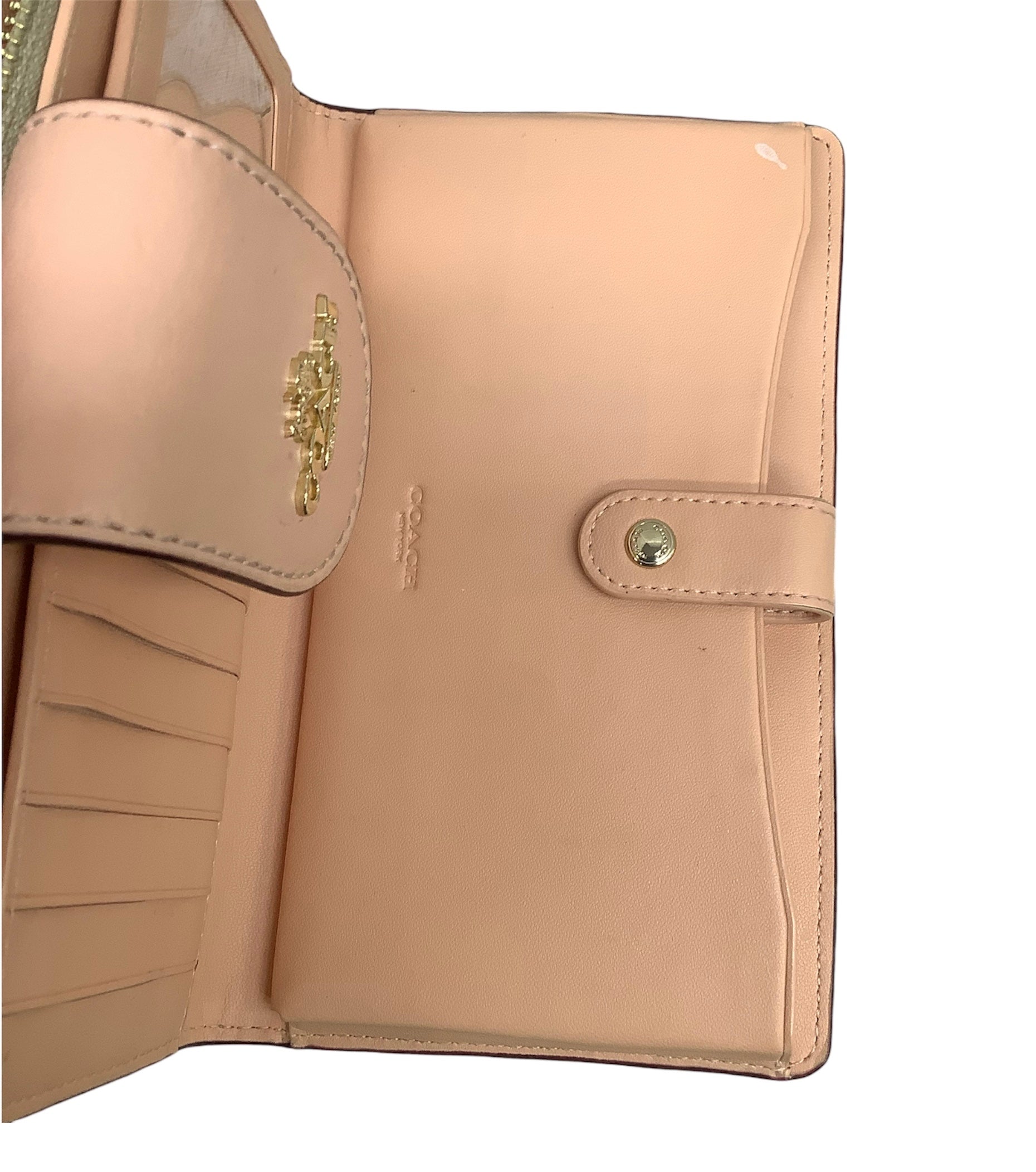 Tan Wristlet Designer by Coach. Size Medium
