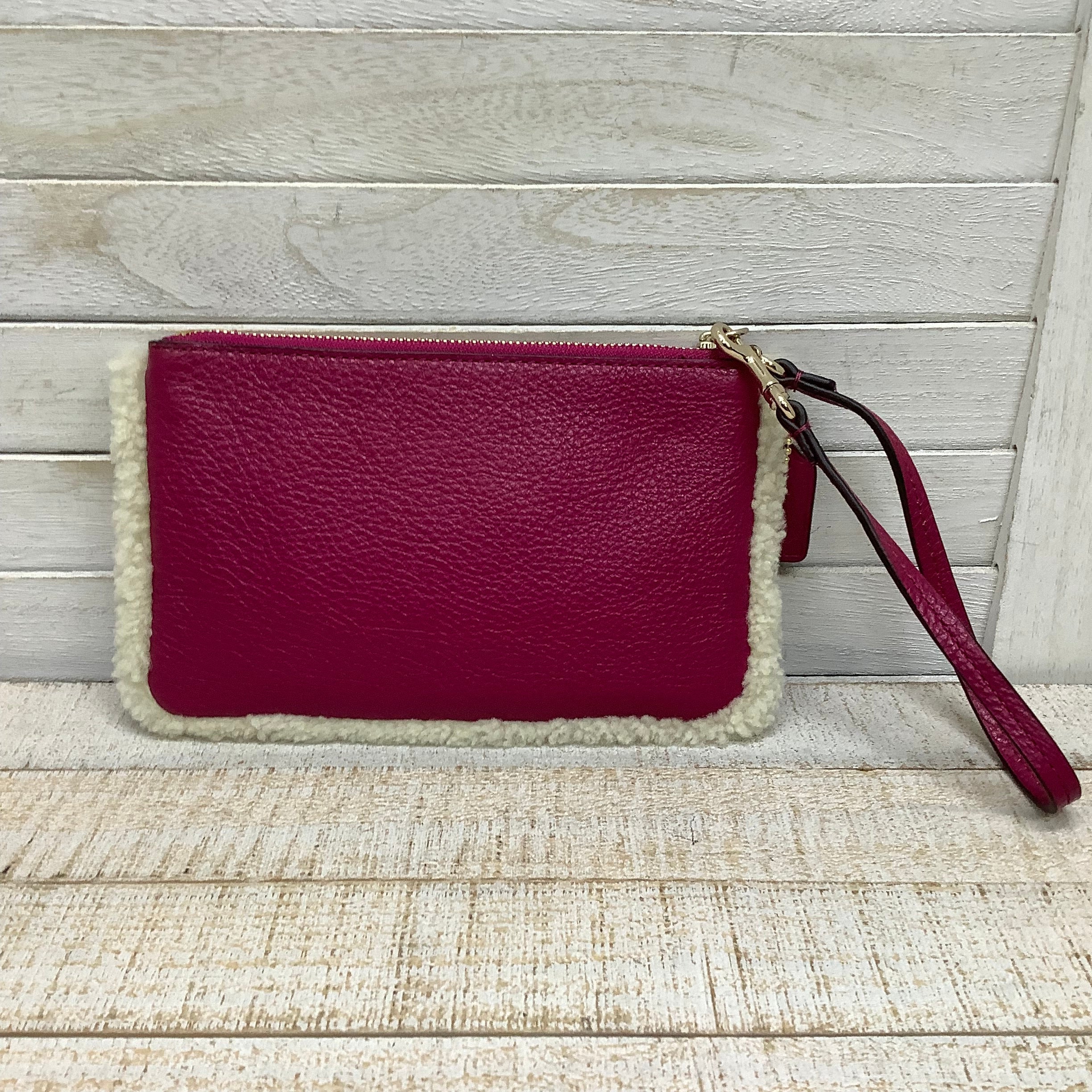 Wristlet Designer by Coach. Size Medium