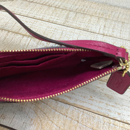 Wristlet Designer by Coach. Size Medium