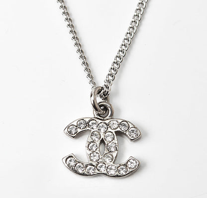 Top Quality Chanel Necklace/Pendant with Rhinestones. Silver/White