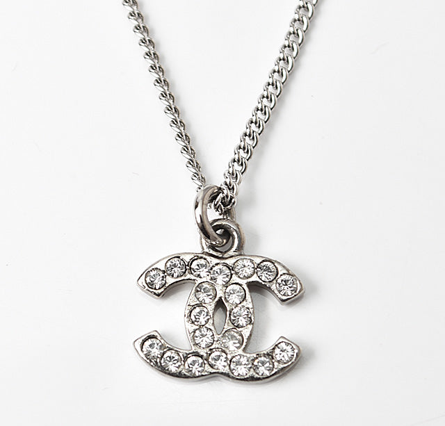 Top Quality Chanel Necklace/Pendant with Rhinestones. Silver/White