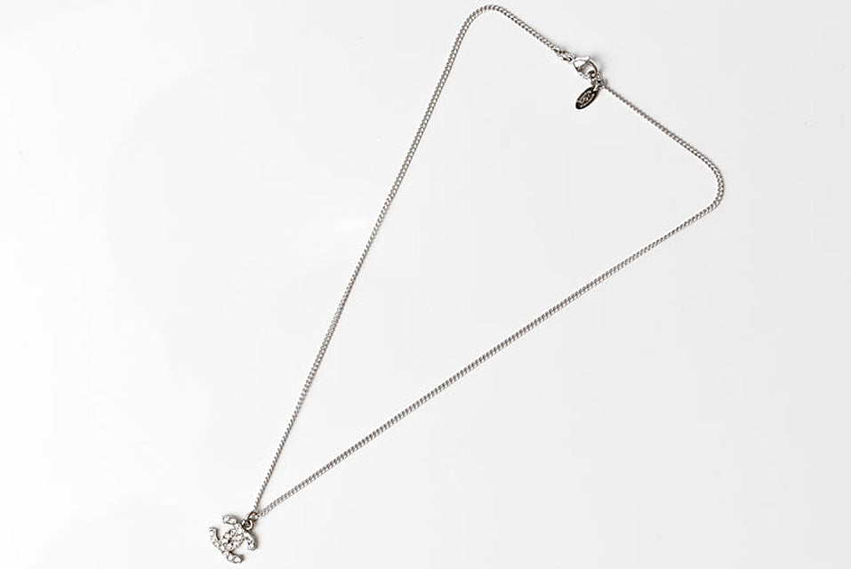 Top Quality Chanel Necklace/Pendant with Rhinestones. Silver/White