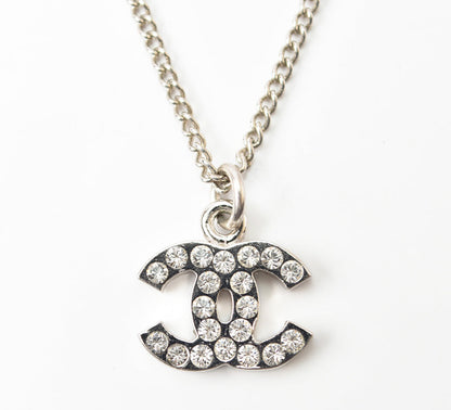 Top Quality Chanel Necklace/Pendant with Rhinestones. Silver/White. 42cm