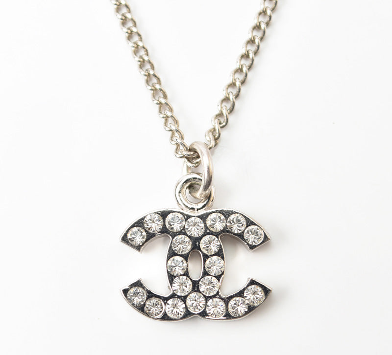 Top Quality Chanel Necklace/Pendant with Rhinestones. Silver/White. 42cm