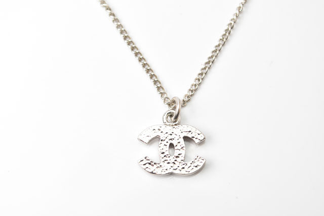 Top Quality Chanel Necklace/Pendant with Rhinestones. Silver/White. 42cm