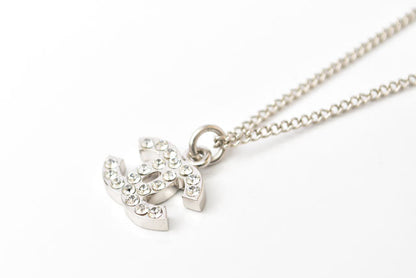 Top Quality Chanel Necklace/Pendant with Rhinestones. Silver/White. 42cm