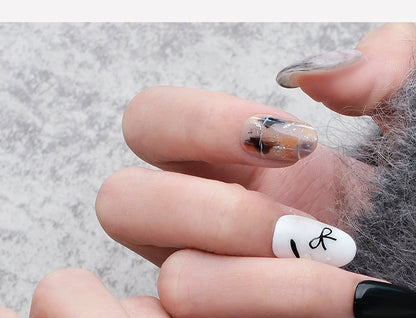 Oval-shaped nails，Nail Art，Nail Designs，Manicure Ideas，Nail Art Trends，Press-on nails，Removable nails，Fake nails