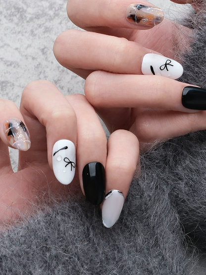 Oval-shaped nails，Nail Art，Nail Designs，Manicure Ideas，Nail Art Trends，Press-on nails，Removable nails，Fake nails