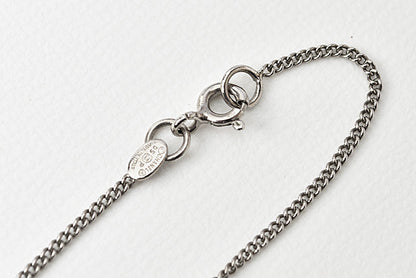 Top Quality Chanel Necklace/Pendant. Metal. Plastic. Black/Silver