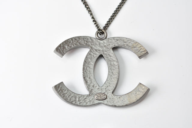 Top Quality Chanel Necklace/Pendant. Metal. Rhinestone. Gunmetal/Red. W3.7?óH2.8cm. 42cm